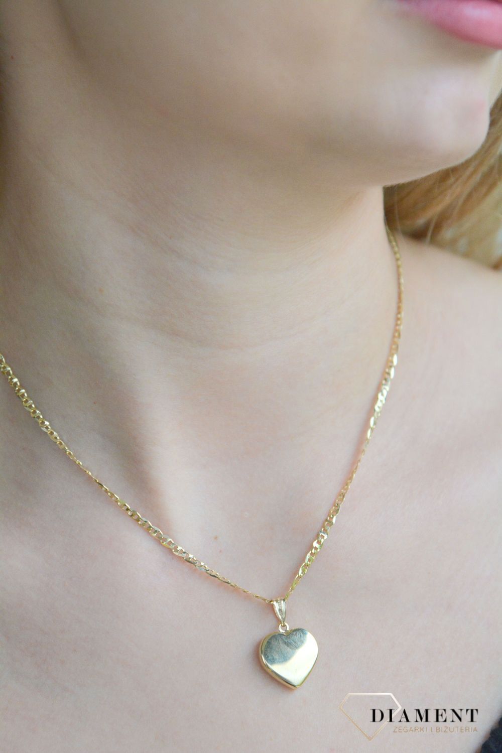 Złota zawieszka damska 375 wypukła grawerowane Serce ZA 4776B 375.jpg